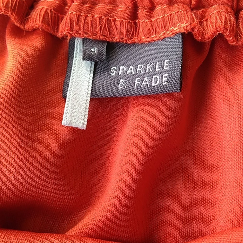 Sparkle and fade knife pleat orange skirt